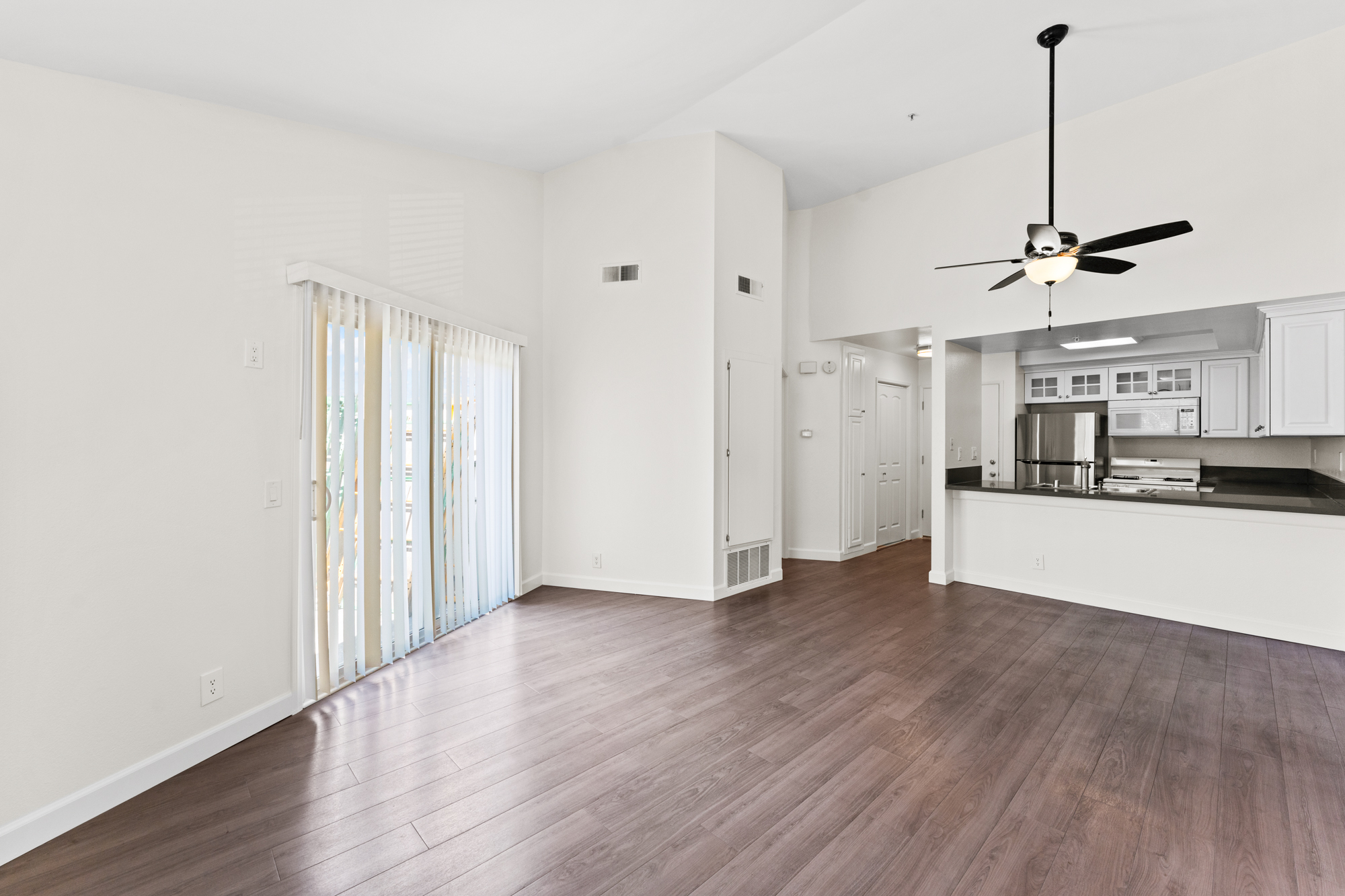 Unit turn - living area with new flooring and paint